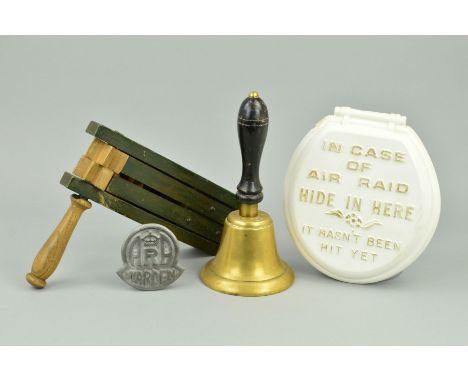 A NUMBER OF WWII ERA AIR RAID BRITISH RELATED ITEMS, to include a wooden rattle marked B &amp; E Ltd ARP 1941, large brass ha