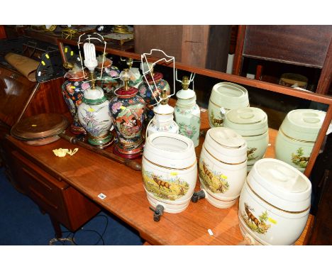 FOUR VARIOUS CERAMIC TABLE LAMPS, including an Aynsley lamp, together with three ceramic sherry jars with stag detail, a copp