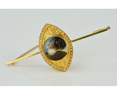 A VICTORIAN PORTRAIT MINIATURE OF A DOG (POSSIBLY A POINTER), signed to the reverse 'W. Essex 1862', mounted in a gold navett