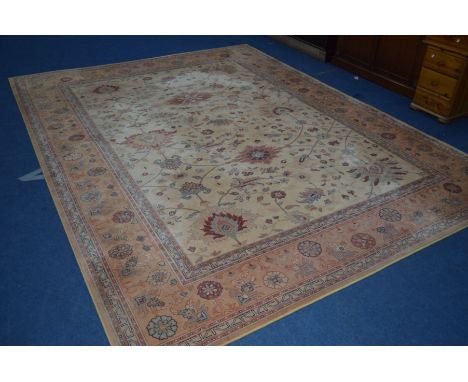 A MODERN WOOLLEN CARPET SQUARE, cream ground, marked Royal Keshan to underside, approximately 366cm x 274cm