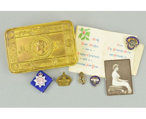 A 1914 PRINCESS MARY TIN, containing original slip, small photograph, two British Legion enamel badges, Kings Crown shoulder 