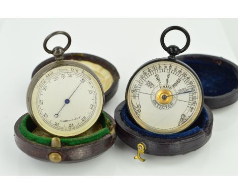 TWO CASED POCKET BAROMETERS, both of circular outline with hinged antique circular cases, the first an early 20th century bar