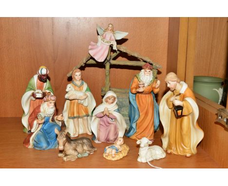 A BOXED ROYAL DOULTON 'PETITE MUSICAL NATIVITY' FROM HOLIDAY TRADITONS COLLECTION, to include Baby Jesus, Mary, Joseph, Sheph