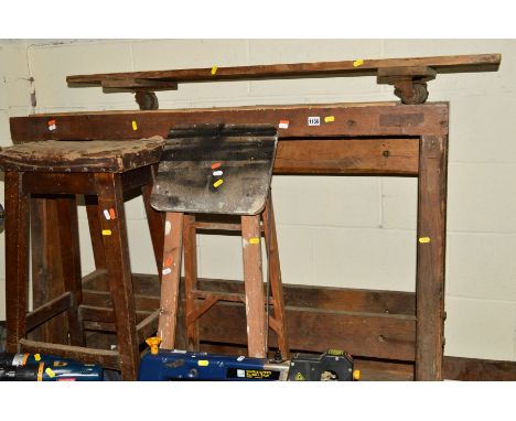 AN OAK WORKHORSE BENCH, together with a mahogany stool, folding stool and an engineers roller board (4)