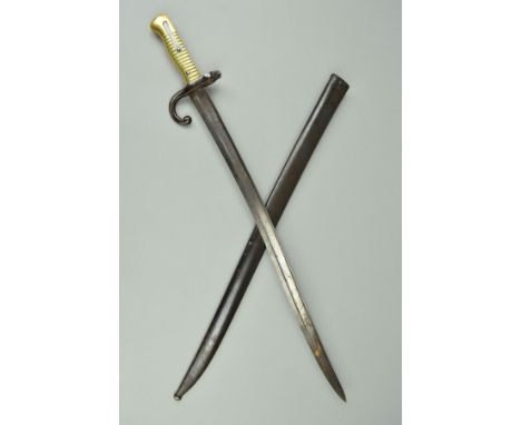 A FRENCH CHASSEPOT BAYONET AND SCABBARD, blade is marked 'Chatellerault 1872' scabbard does not bear the same serial number a