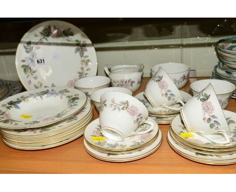 ROYAL WORCESTER 'JUNE GARLAND' TEAWARES, to include cake plate, six cups (one hairline), seven saucers, six side plates, milk