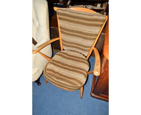 AN ERCOL 1960'S BEECH ARMCHAIR, (s.d.)