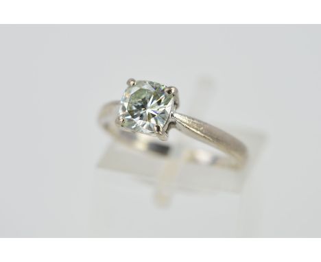 AN 18CT GOLD SINGLE STONE SYNTHETIC MOISSANITE RING, the cushion cut moissanite within a four claw setting to the tapered sho