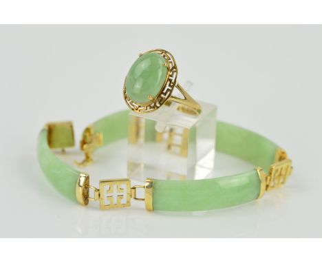 A 9CT GOLD JADE BRACELET AND RING, the ring designed as an oval jade cabochon within an open Greek-key surround, ring size S,