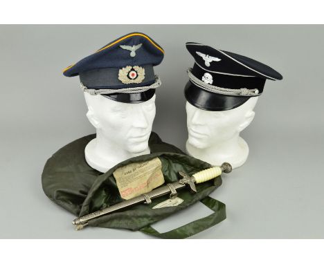 THREE ITEMS OF WWII ERA GERMAN 3RD REICH NATURE, all believed to be copies of originals, a black Waffen S.S. Visor cap, a Wer