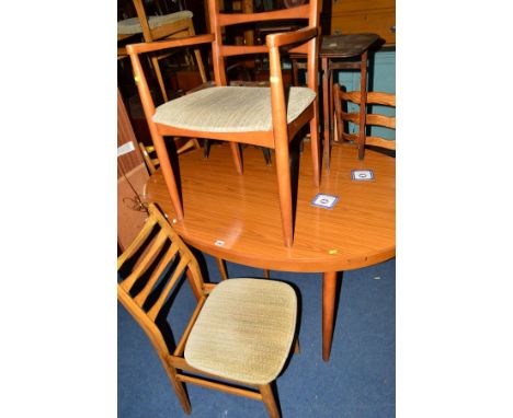 AN OVAL TOPPED DINING TABLE, and five 1970's ladder back chairs including one carver (6)