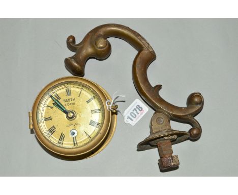A SMALL BRASS SMITHS SHIPS CLOCK, approximate diameter 11.5cm, together with a brass door knocker