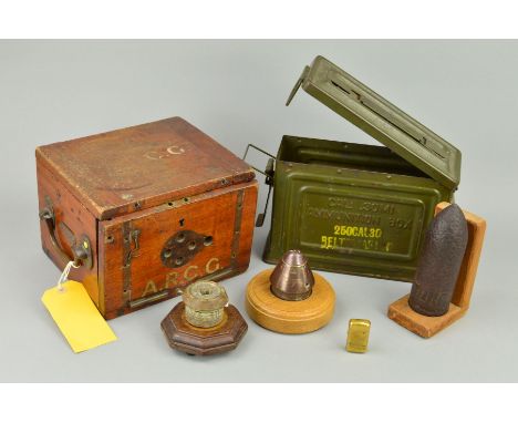 A WOODEN BOX FOR A 'WEYMOUTH GYROSCOPE', WWI era, 30 ammunition box containing an inert WWI era dug up shell, two military fu