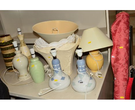 A SELECTION OF SIX LAMPS, a vase, shades and a roll of fabric, to include a pair of Nao ceramic lamps 