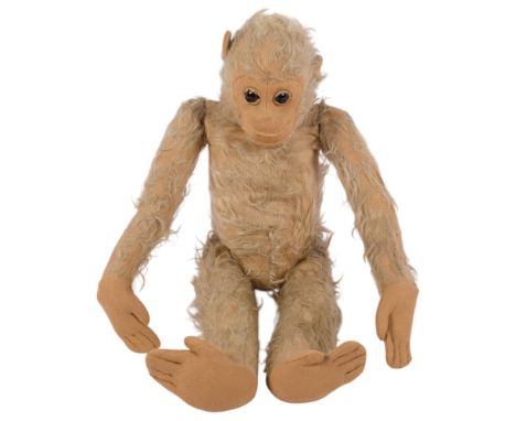A Vintage blond Plush monkey (worn), complete with both eyes, L61cm