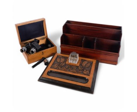 A mahogany stationery rack, 35.5cm across, a Becks student's microscope in wooden case, and a carved desk stand with foliate 