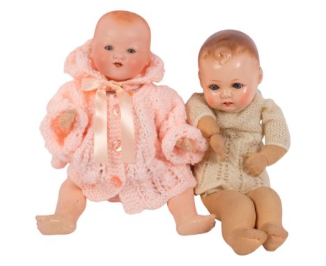 ARMAND MARSEILLE - GERMANY - a small bisque-headed doll with jointed limbs, 351/2 2/12K, L35cm, together with another small b