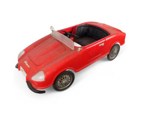 A child's Graguar red toy pedal car, L100cm