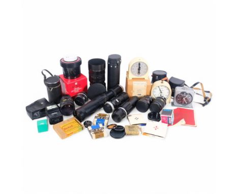 A collection of various Vintage camera lenses, including a Meyer-Optik Gorlitz telephoto lens, serial no. 4690589 4-300, a Vi