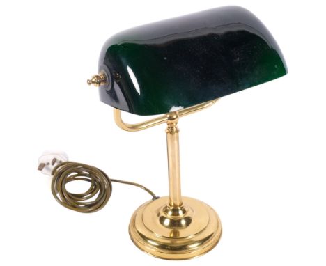 An adjustable brass desk lamp, with black shade, H35.5cm