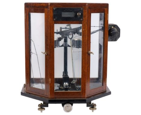 A Vintage laboratory balance scale, in unusual case with 2 doors, height overall 47cm