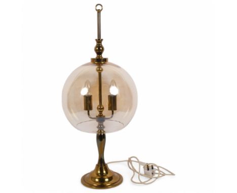 A modern brass amber glass 'Globe' twin light table lamp, H72cm