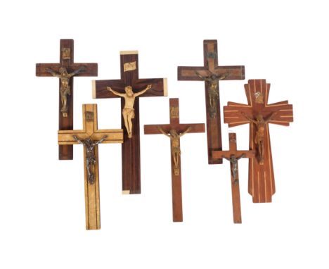 7 Vintage crucifixes, longest 35cm