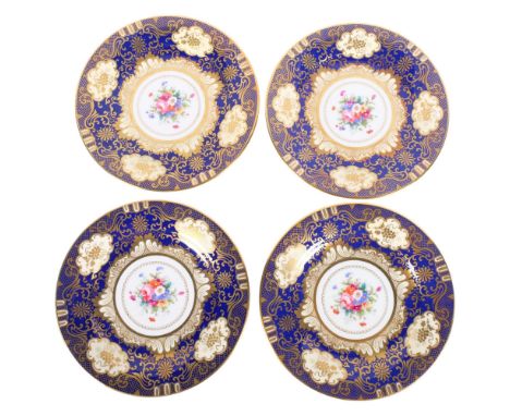 A set of 4 Vintage Crown Staffordshire cabinet plates, with painted floral designs and gilded cobalt surrounds, 22cm