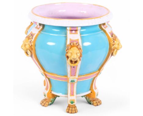 MINTON - a Victorian Majolica pottery jardiniere, baluster form with turquoise glaze, with lion ring bosses, lion paw feet an