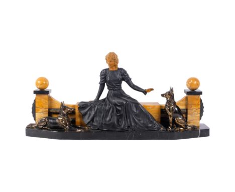 A large Art Deco Continental marble and spelter group, depicting a girl seated on a bench flanked by Alsatians, L72cm
