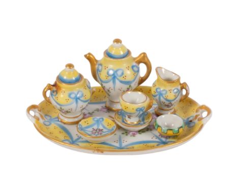 A miniature doll's house glass and painted group of items, including 2 ewers, 2 small saucers, 2 mugs, etc, and a Continental