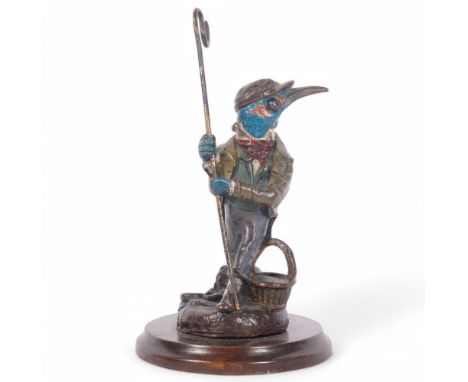 After Louis Anquetin, a painted and gilded bronze model of a fisherman with hook and basket, on circular base, H17cm