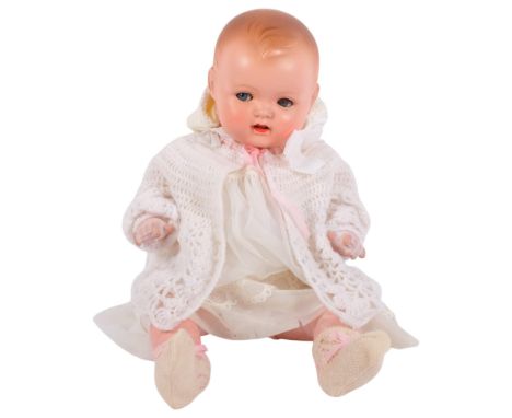 A German bisque-headed doll with jointed limbs, marked S&amp;R Germany, 30/5, L50cm