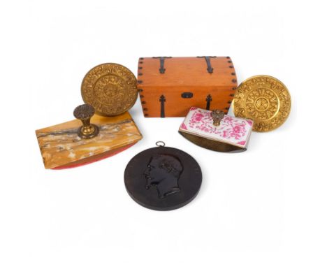 A box of various items, including a pair of Victorian chased and gilded brass curtain ties, a Victorian bois durci profile pl