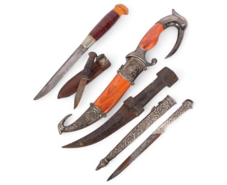 A horn-handled Jambiya, an Antique Ottoman knife with plated handle and scabbard, a Bowie type knife, and 2 others (5)