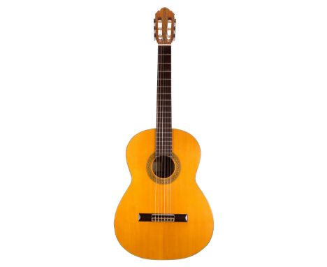 Kasuga Model G-100 classical guitar, made in Japan; Finish: natural; Fretboard: rosewood; Frets: good; Case: soft bag; Overal