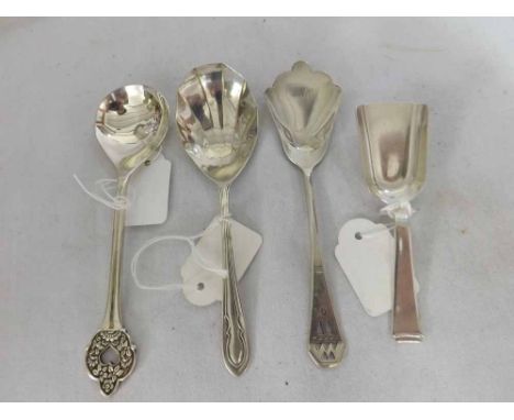 A Mixed Lot comprising: a 20th Century Sheffield Silver Preserve or Caddy Spoon, a further Continental Preserve Spoon and two