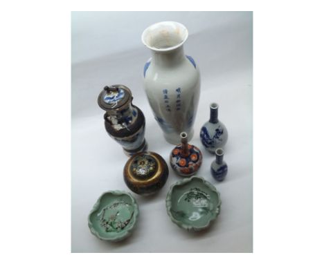 An Oriental Baluster Vase decorated in blue with a Chinese river scene, small Imari Spill Vase, two other Blue Oriental Spill