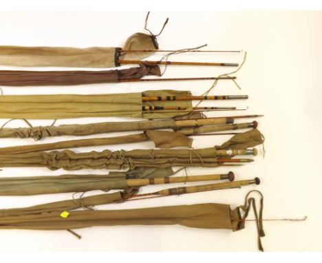 Nine assorted vintage fishing rods   120-150 
