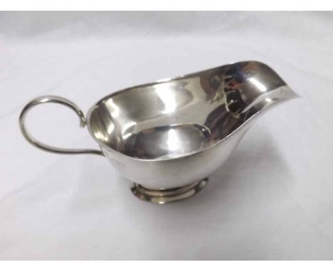 George V small oval sauceboat on oval foot, looped handle, Birmingham 1927, maker W Hutton & Sons, weight 60gms 
