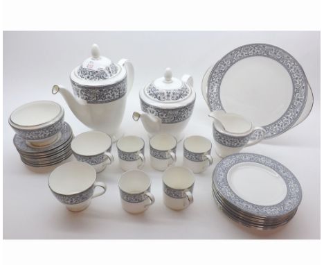 A quantity of Minton Infanta Tea and Coffee Wares comprising: Teapot, Coffee Pot, Milk Jug, Sugar Basin, double-handled Sandw