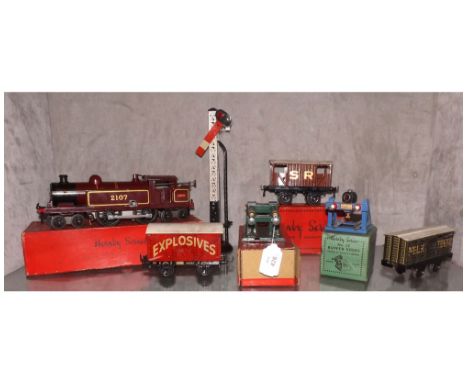 A small collection of Hornby "O" Gauge to include Clockwork No 2 LMS Tank Locomotive in burgundy livery with original box; bo