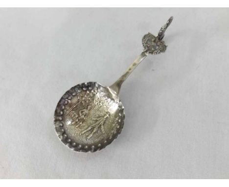Late 19th or early 20th Century Dutch Silver novelty Caddy spoon (repaired), the bowl decorated with a scene of two figures a