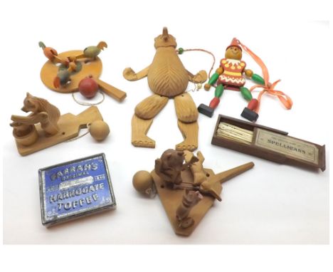 A small tray containing a quantity of Vintage Wooden Mechanical type Toys   30-50