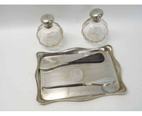 A George V Silver Dressing Table Tray of shaped rectangular form with wavy edge, banded engine turned centre with monogram, 1