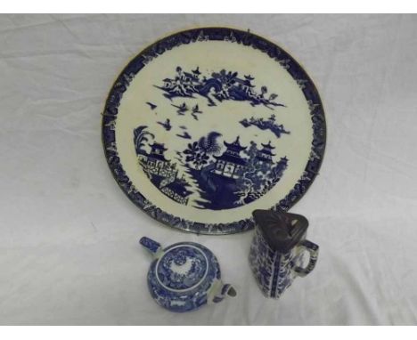 A Copeland Spode small compressed circular Lidded Teapot, decorated with the Blue Italian pattern; together with a small Ridg