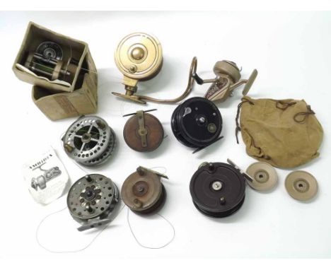 Nine assorted fishing reels including vintage Australian Billy Lee "Lixall" side cast, Brass and Oak spool reel, Bakelite kno