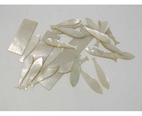 A collection of Chinese engraved Mother of Pearl gaming tokens (4 rectangular, one circular, 20 fish shaped) (25)   50-70 