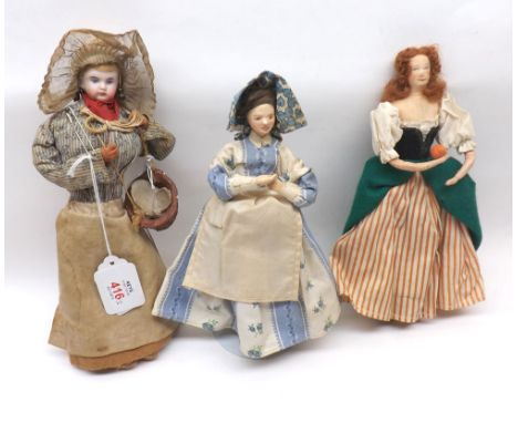 A collection of three Dolls, comprising of: a Bisque Brettan Doll dressed as a fish seller; a Vintage Composition Doll with p