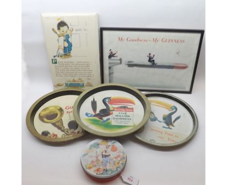 A small collection of various Vintage Guinness items to include: four Drinks Trays, Biscuit Tin and a 1943 John Gilroy Print 